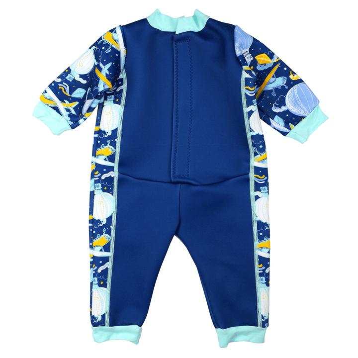 Fleece-lined baby wetsuit in navy blue with light blue trims and sky themed print, including airplanes, hot air balloons, clouds and kites. Back.