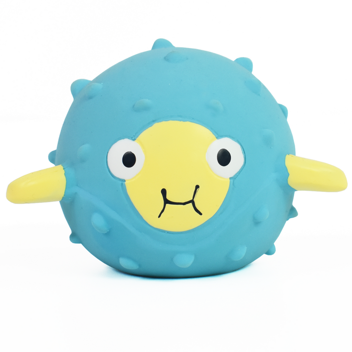 Cute pufferfish bath toy in blue with smiley face.