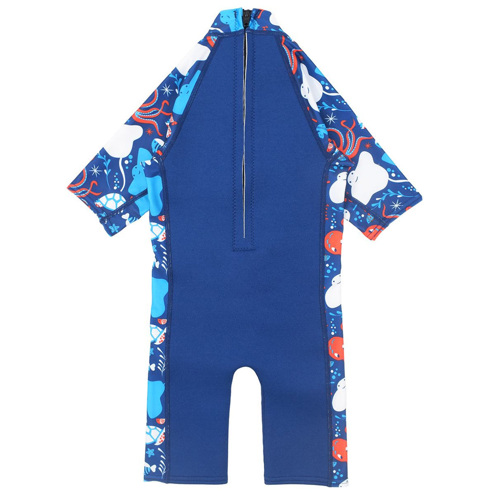 One piece UV sun and sea wetsuit for toddlers in navy blue. Sea life themed print including turtles, octopus, fish, stingray and more on sleeves, side panels and neck. Back.