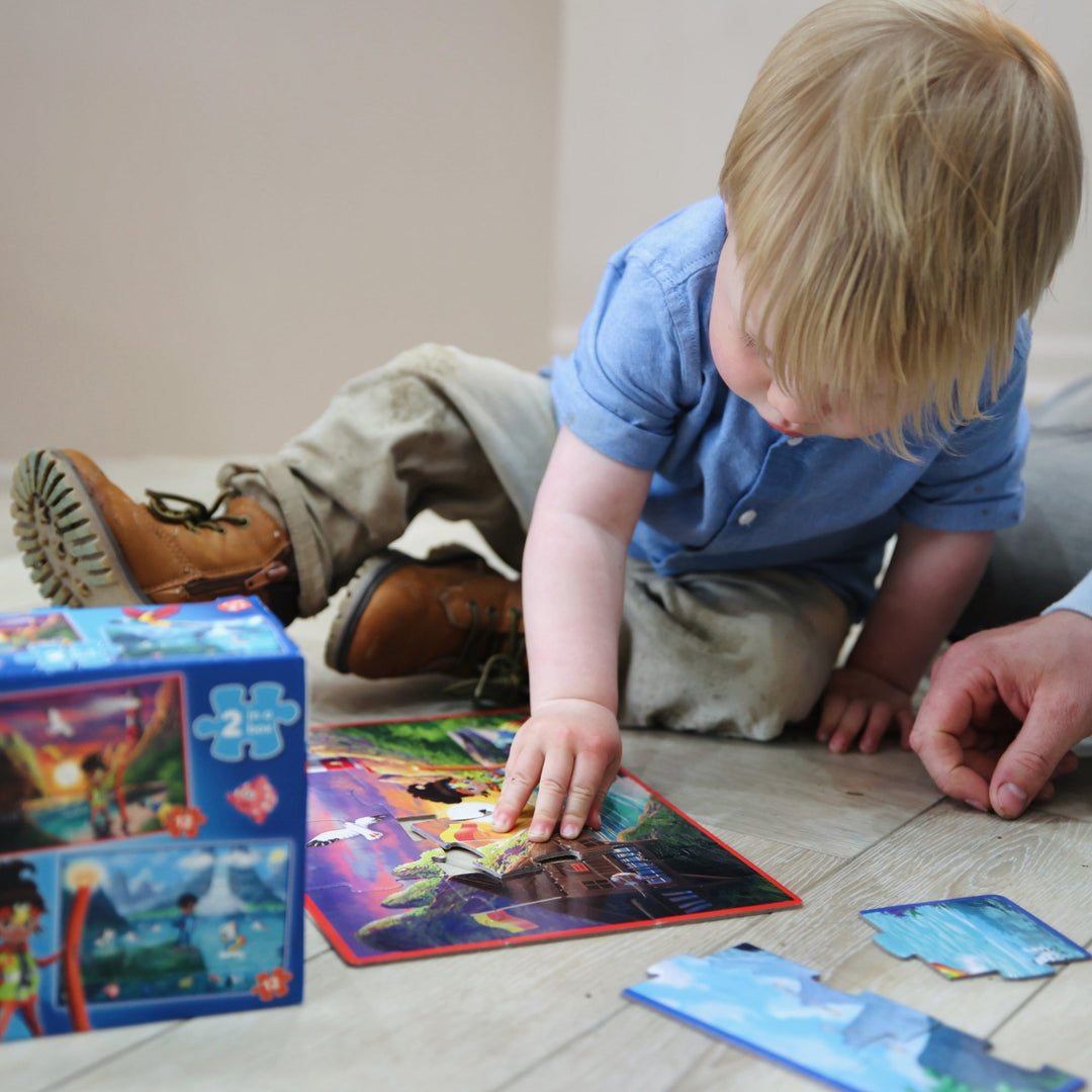 Toddler completing jigsaw puzzle