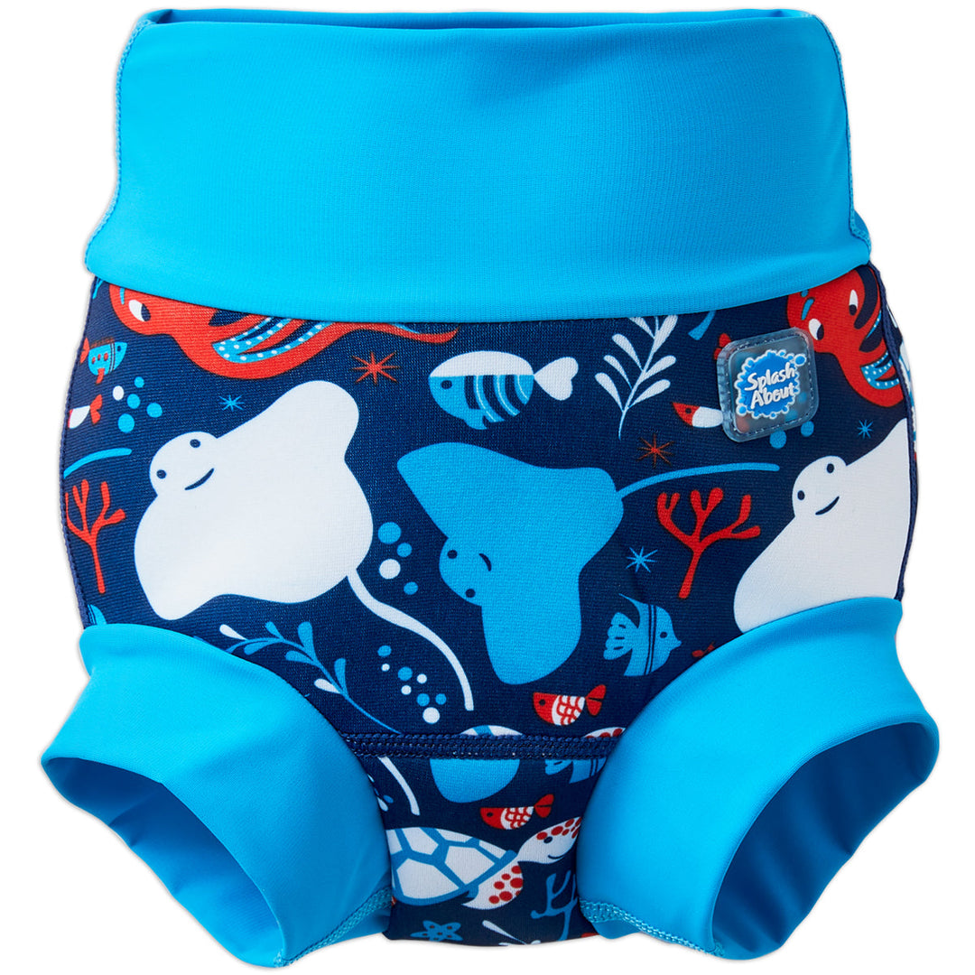 Reusable swim nappy in navy with cyan ribs and sea creatures themed print. Front.