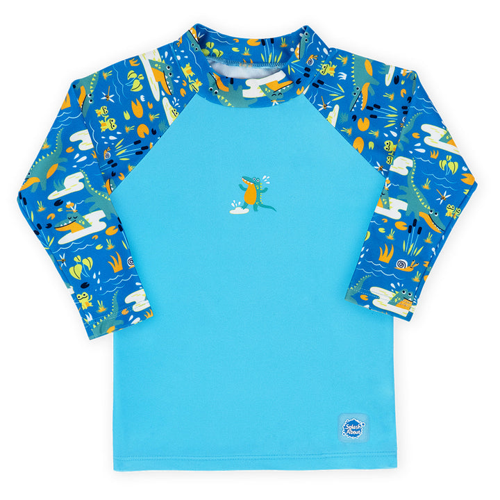 UV protective long sleeve rash top in blue, featuring crocodiles and frogs themed print on the chest and sleeves. Front.