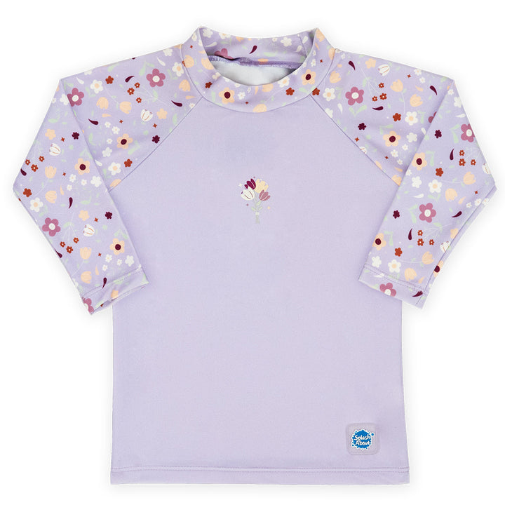UV protective long sleeve rash top in lilac, and floral themed print on the chest and sleeves. Front.