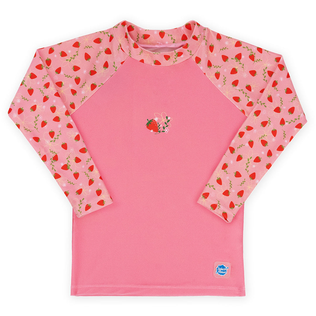 UV protective long sleeve rash top in pink, and strawberries themed print on the chest and sleeves. Front.