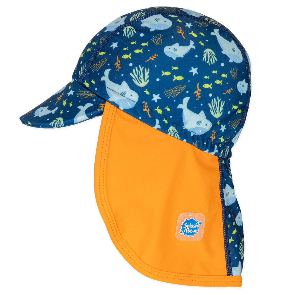 Legionnaire style sun hat in navy and orange, with sharks themed print panel. Side.