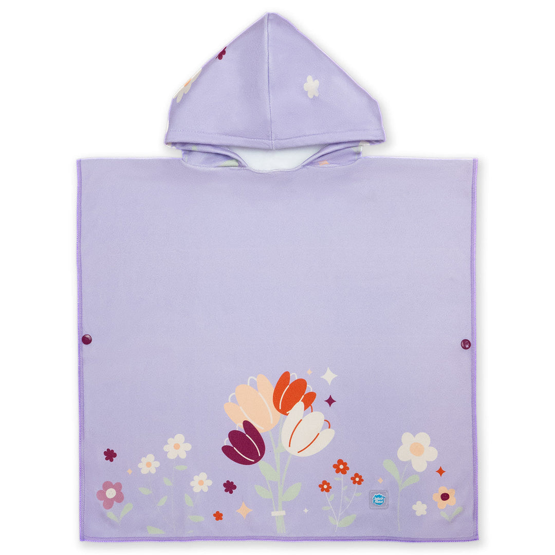Flat lay image of poncho towel in lilac with floral themed print. Front.