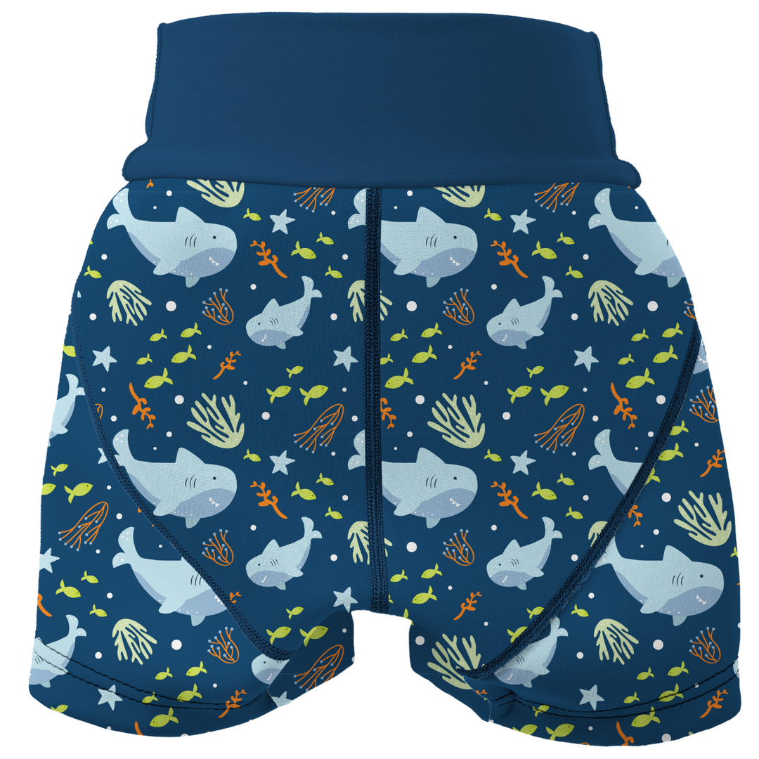 Neoprene swim shorts in navy and sharks themed print. Back.