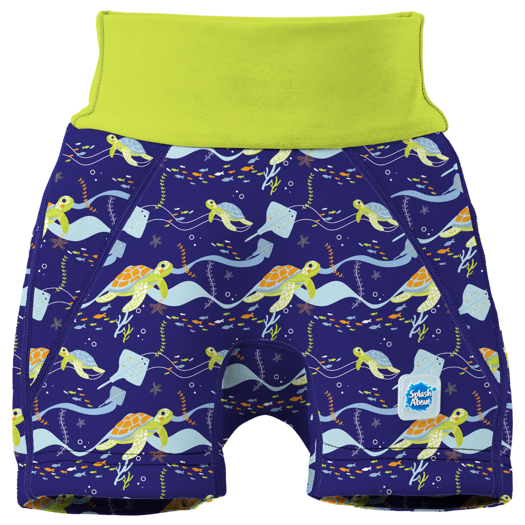Neoprene swim shorts in navy and turtles and mantrays themed print. Front.