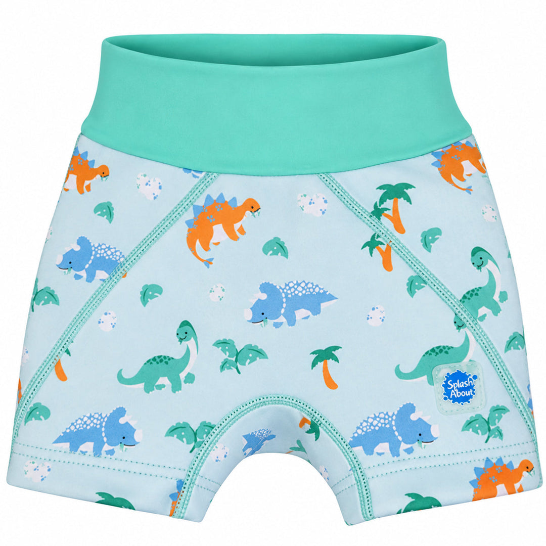 Neoprene swim shorts in mint and dinosaurs themed print. Front.