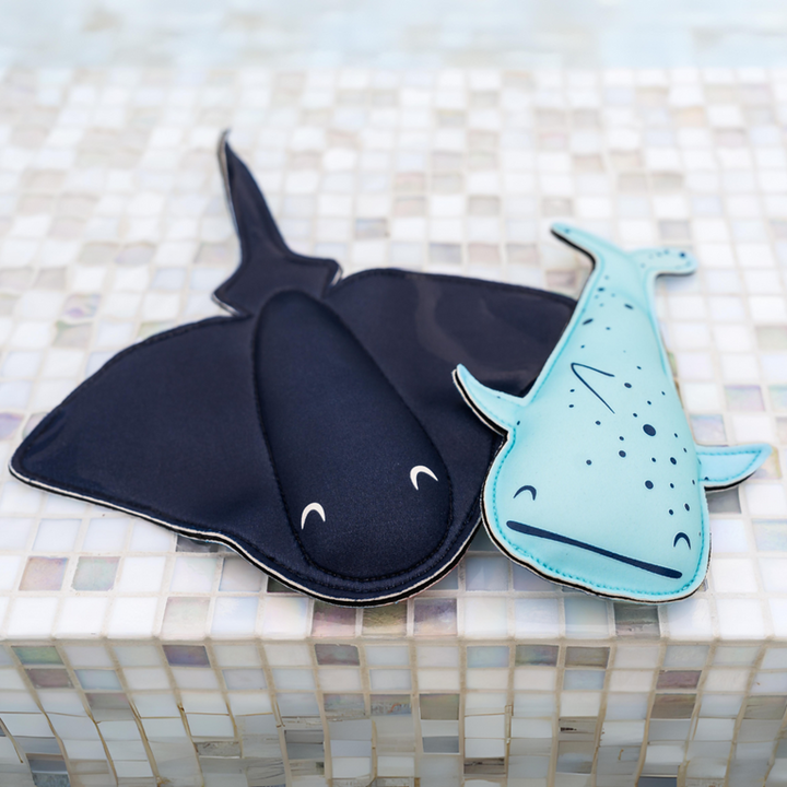 Whale and stingray themed toys, poolside