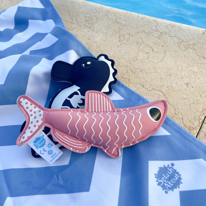 Sardine and seahorse themed neoprene toys, poolside