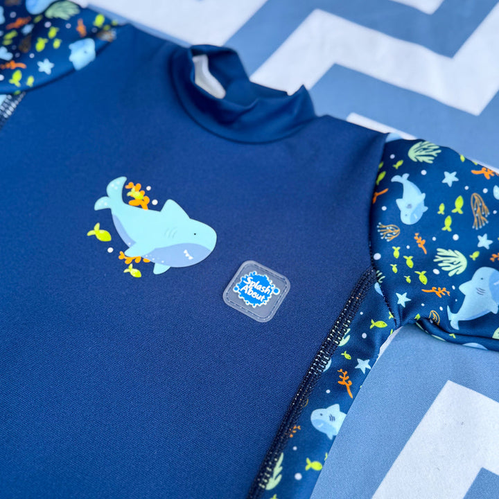 Close up of sharks themed print.