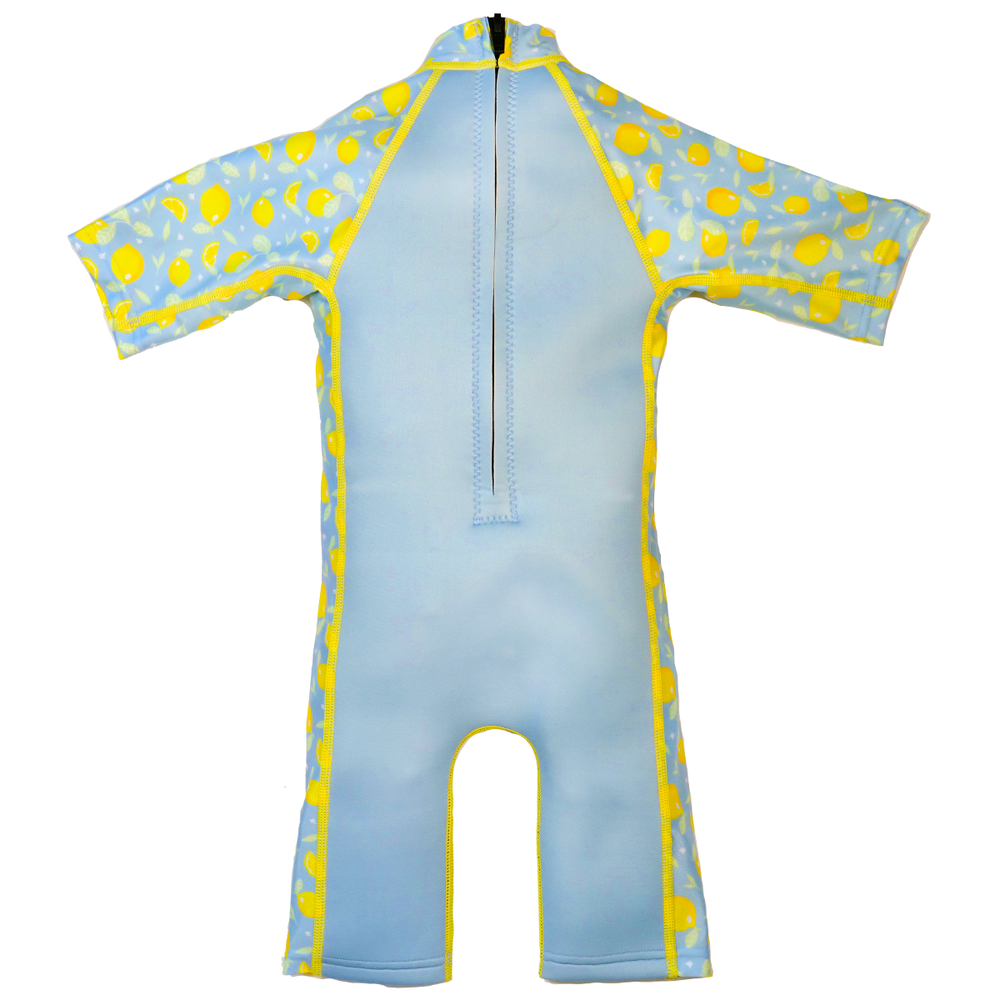 One piece UV sun and sea wetsuit for toddlers in light blue, featuring lemons themed print on sleeves, side panels, neck and chest. Back.