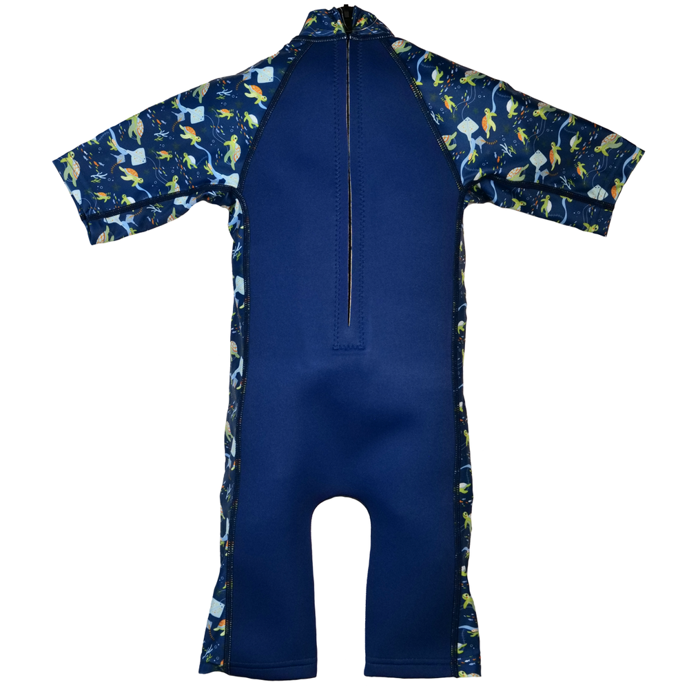 One piece UV sun and sea wetsuit for toddlers in navy blue, featuring sea turtles, coral and fish themed print on sleeves, side panels, neck and chest. Back.