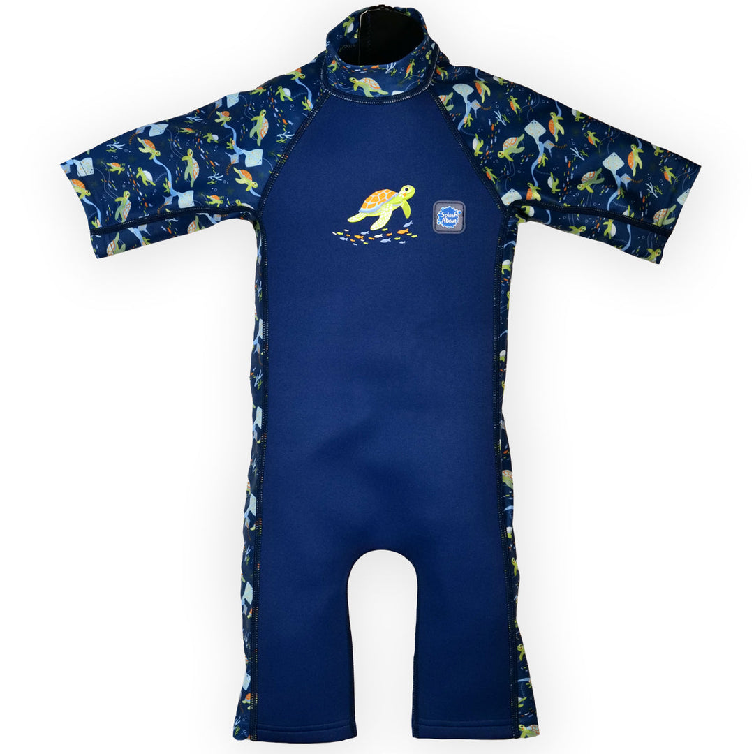 One piece UV sun and sea wetsuit for toddlers in navy blue, featuring sea turtles, coral and fish themed print on sleeves, side panels, neck and chest. Front.