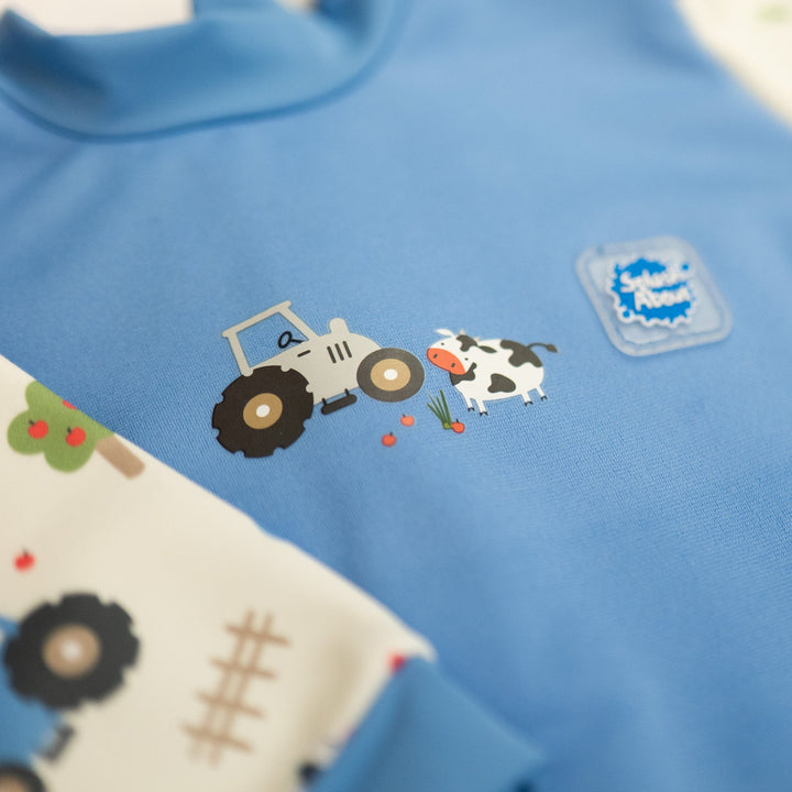 Close up of farm themed print.