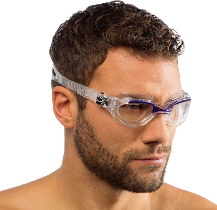 Man wearing clear and blue swim goggles