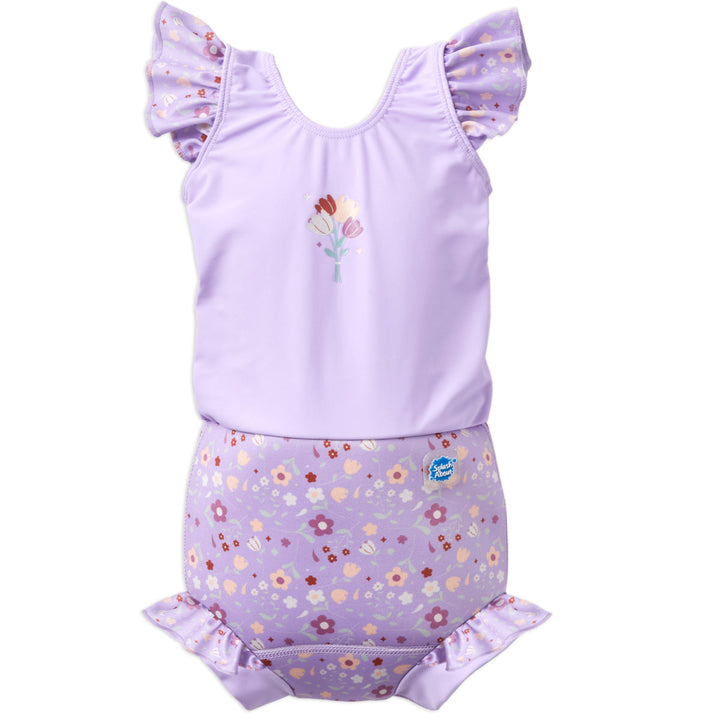 Happy Nappy Costume in lilac and floral themed print, featuring frills in arms and legs. Front.