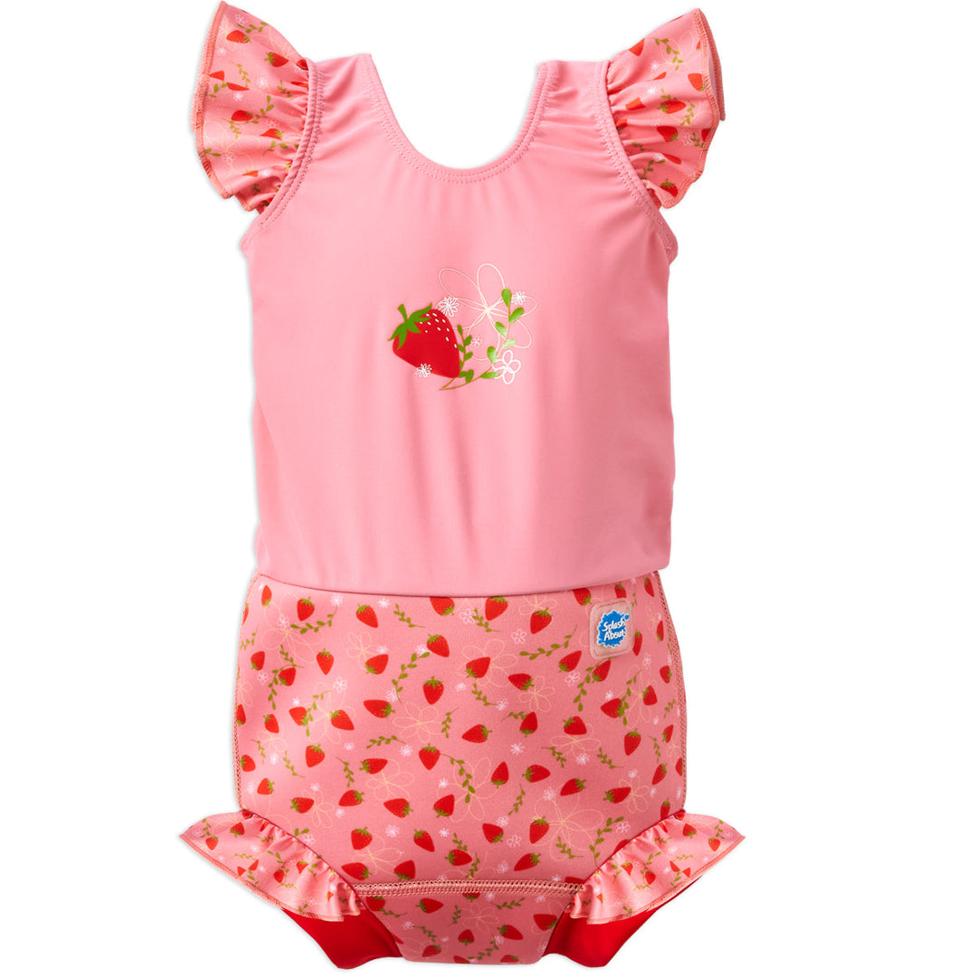 Happy Nappy Costume in pink with red trims and strawberries themed print, featuring frills in arms and legs. Front.