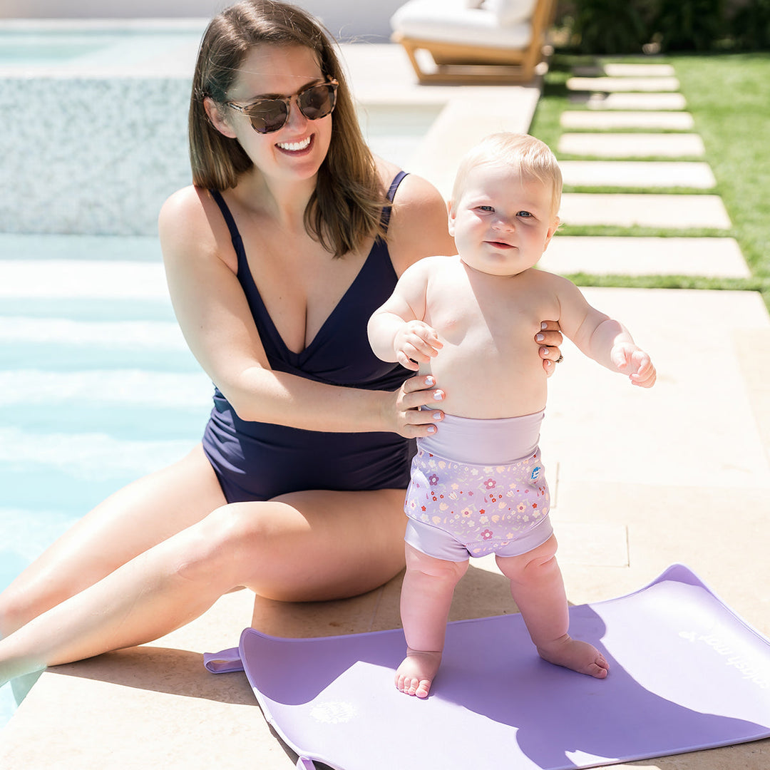 Child on neoprene mat