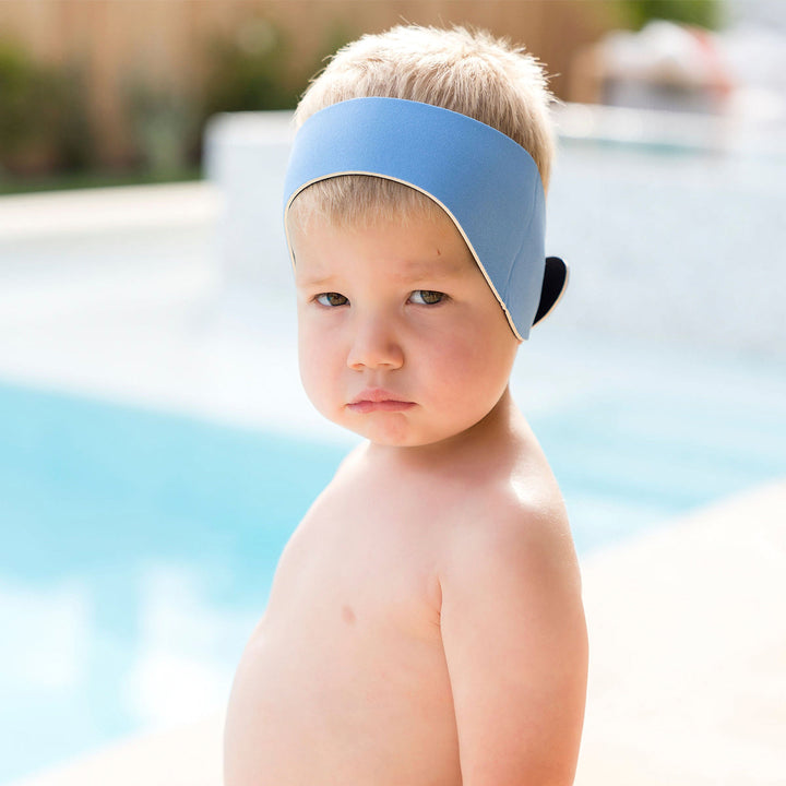 Little one wearing swim ear band in cashmere blue, front