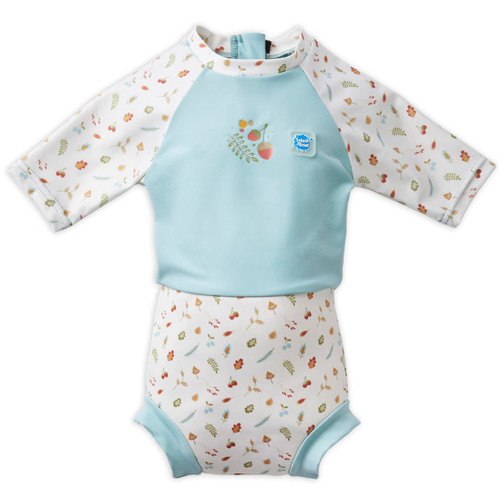 Happy Nappy Sunsuit in light blue and white, and acorns and leaves themed print. Front.