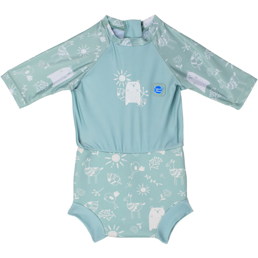 Happy Nappy Sunsuit in greenish blue and white, and animals themed print including bears, birds and llamas. Front.