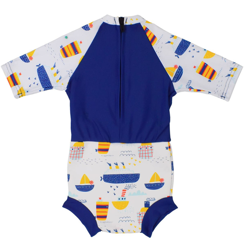 Happy Nappy Sunsuit in white and navy, and boats themed print. Navy back panel with zip. Back.