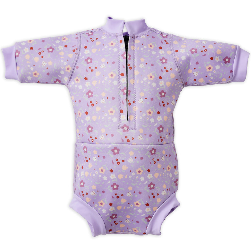 Baby wetsuit with built in swim nappy in lilac with floral themed print. Back.
