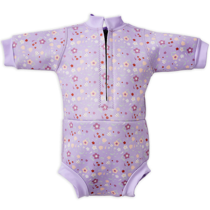 Baby wetsuit with built in swim nappy in lilac with floral themed print. Back.