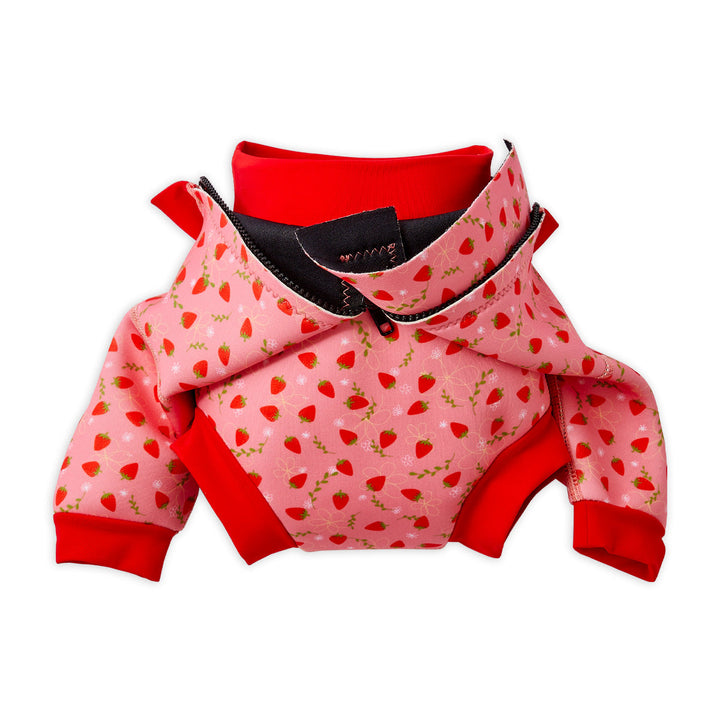 Baby wetsuit with built in swim nappy in pink with red trims and strawberries themed print. Built-in nappy.