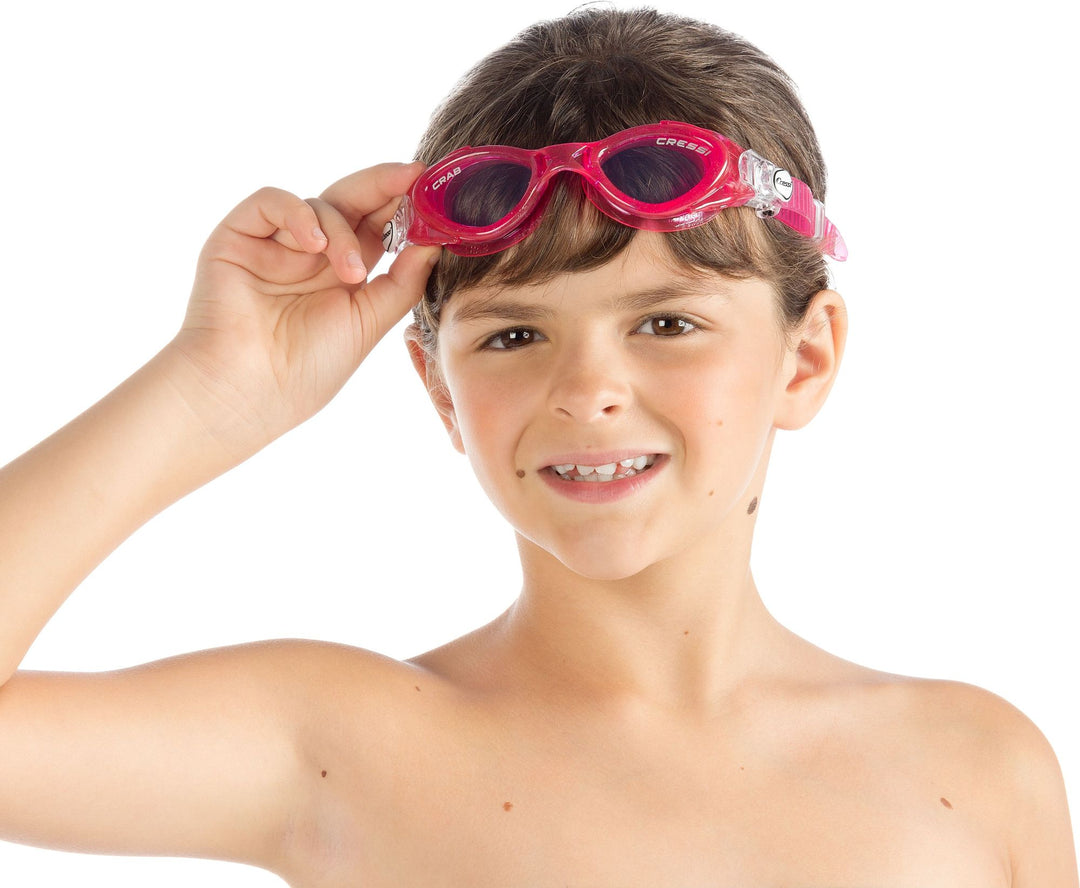 Little one wearing swimming goggles