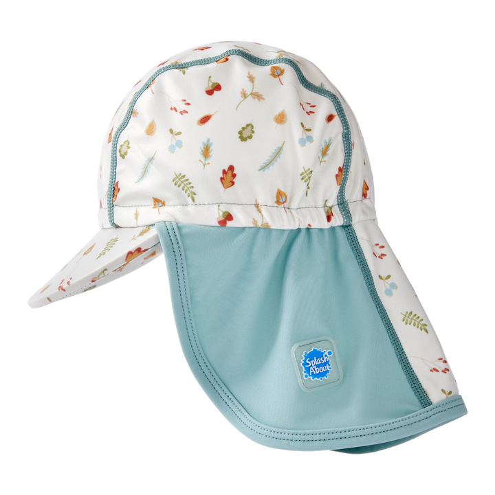 Legionnaire style sun hat in light blue and white, with acorns and leaves themed print panel. Side.