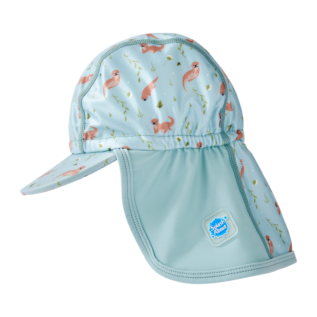 Legionnaire style sun hat in light blue, with otters themed print panel. Side.