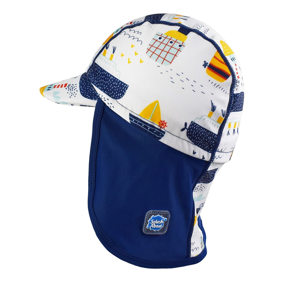 Legionnaire style sun hat in navy and white, with boats themed print panel. Side.
