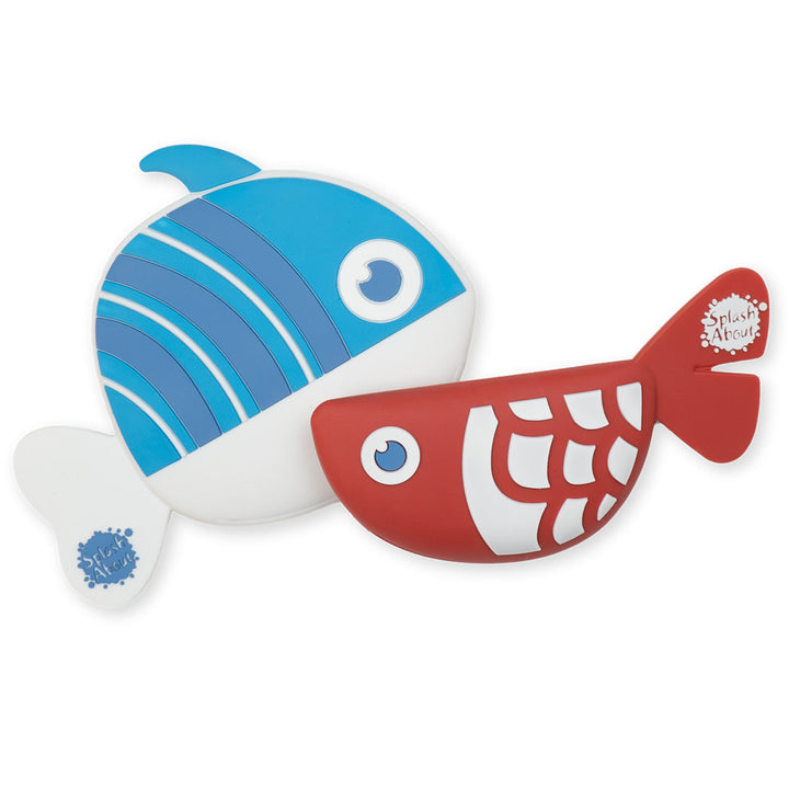 Flat lay image of a blue and red silicone fish toy, and a red and white silicone fish toy