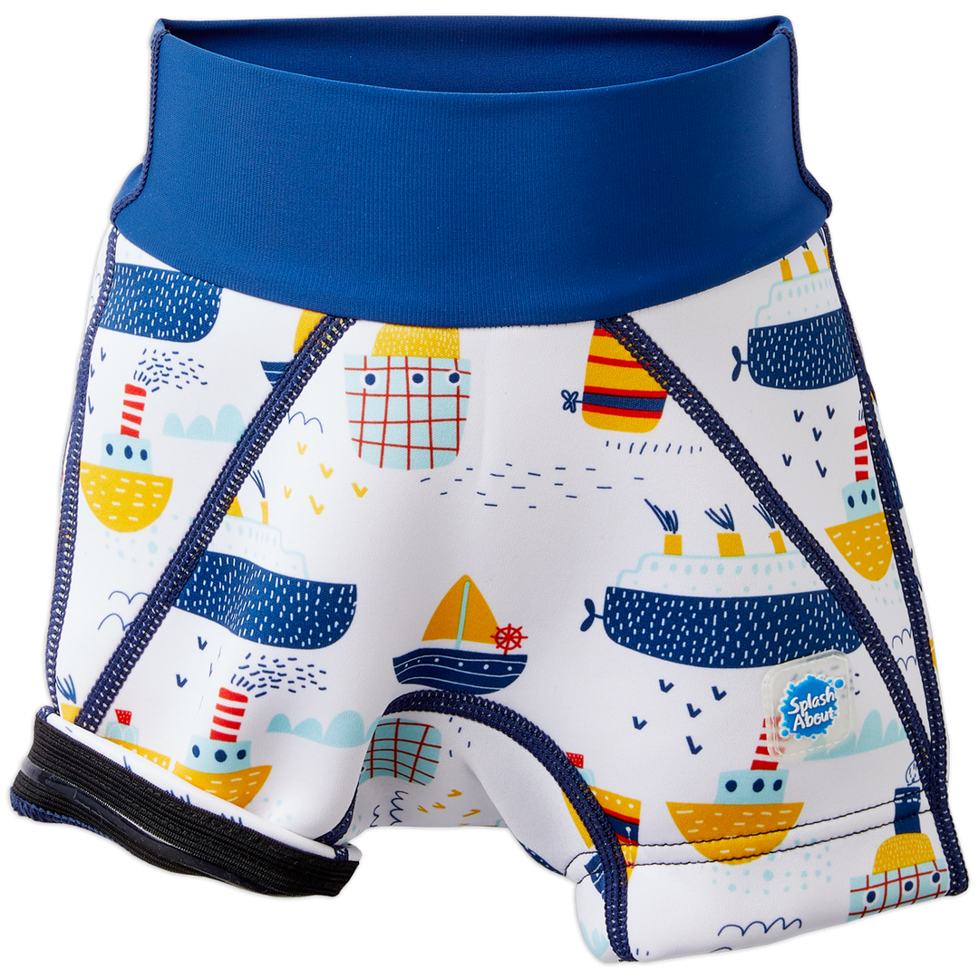 Neoprene swim shorts in white with blue navy waist and boats themed print. Front, showing silicone seal underneath.