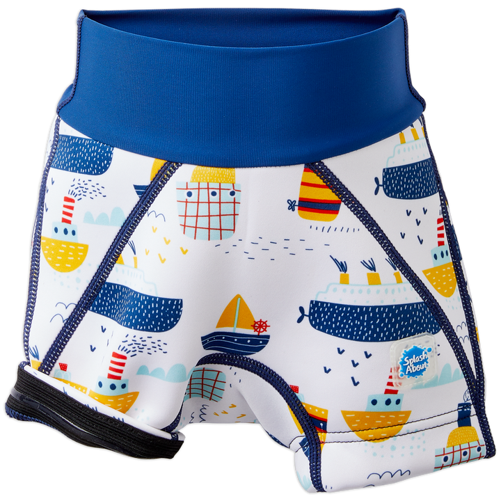 Neoprene swim shorts in white with blue navy waist and boats themed print. Front, showing silicone seal underneath.