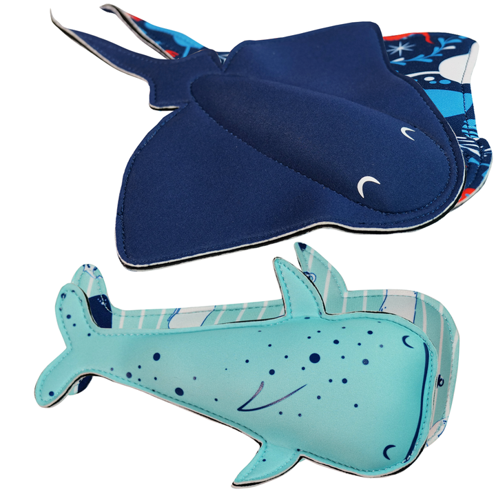 Flat lay image of stingray and whale themed neoprene toys