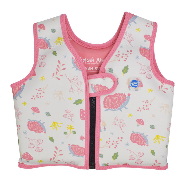 Neoprene swim vest for toddlers with non-removable floats in white, pink trims and forest themed print, including hedgehogs, mushrooms and leaves. Front.