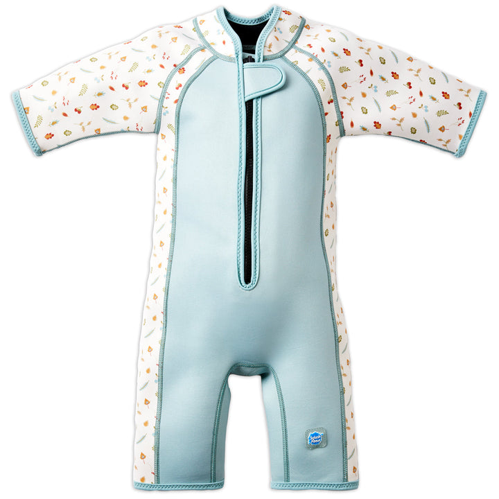 Shorty wetsuit in light blue, featuring acorns and leaves themed print over white background in sleeves and side panels. Front.