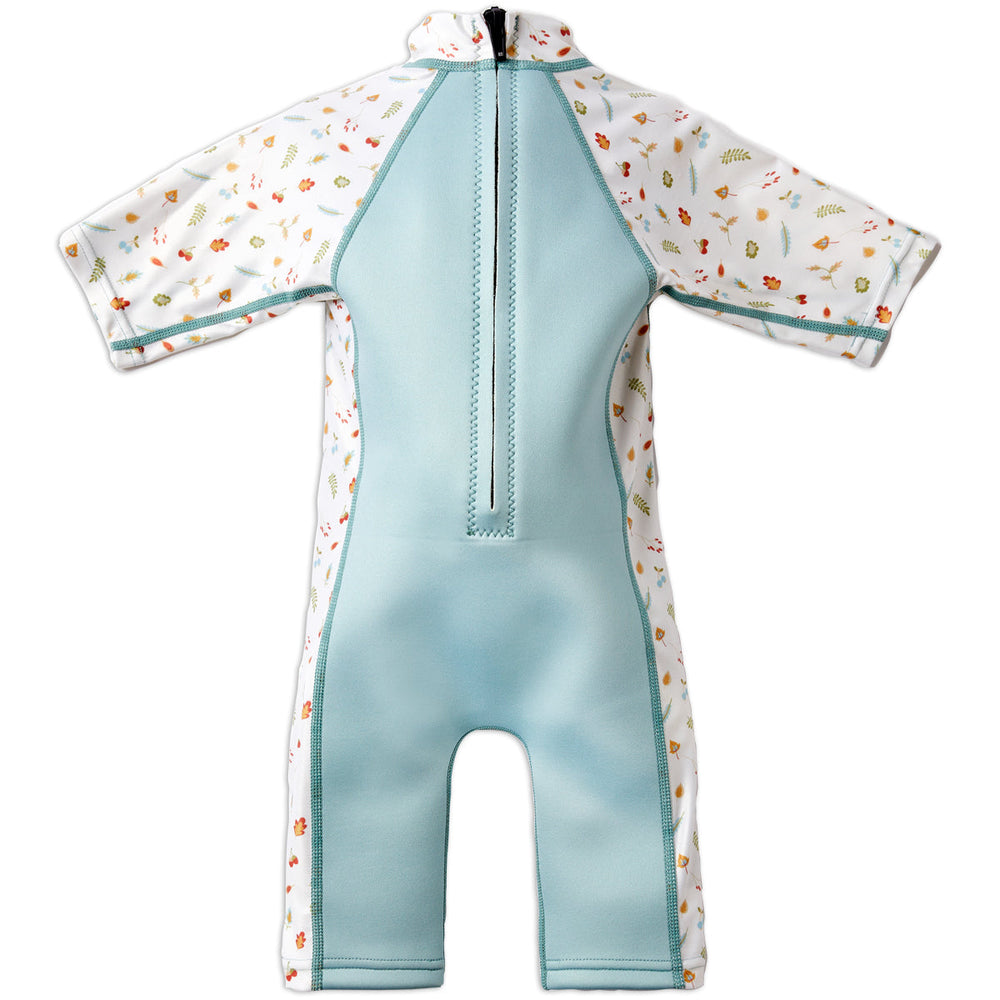 One piece UV sun and sea wetsuit for toddlers in white and light blue. Acorns and leaves themed print on sleeves, side panels, neck and chest. Back.