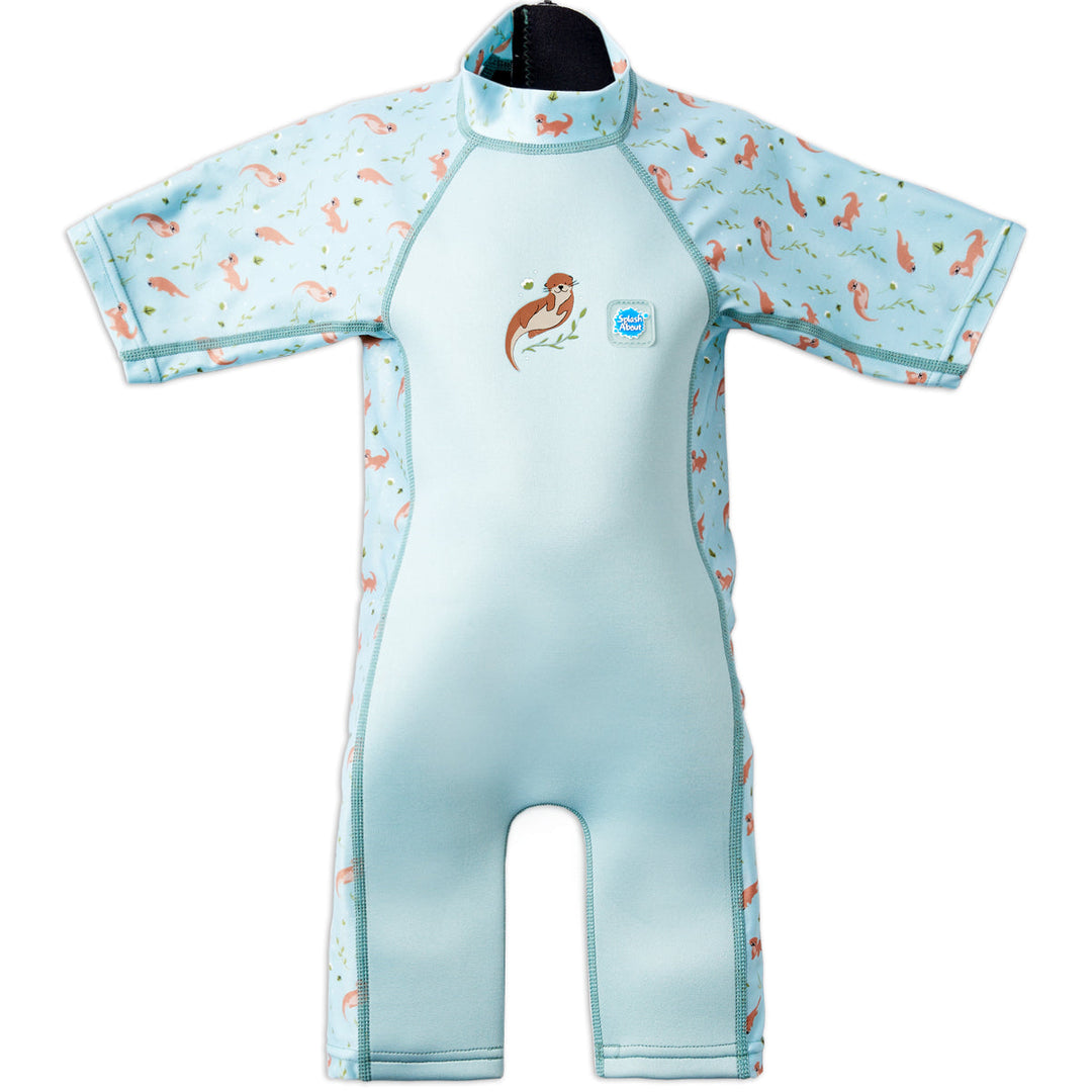 One piece UV sun and sea wetsuit for toddlers in light blue, featuring otters themed print on sleeves, side panels, neck and chest. Front.