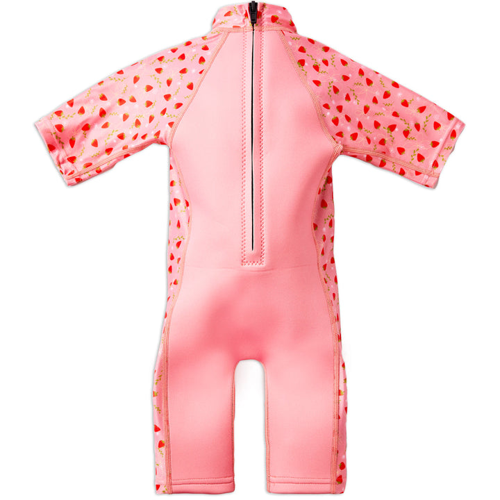 One piece UV sun and sea wetsuit for toddlers in pink, featuring strawberries themed print on sleeves, side panels, neck and chest. Back.