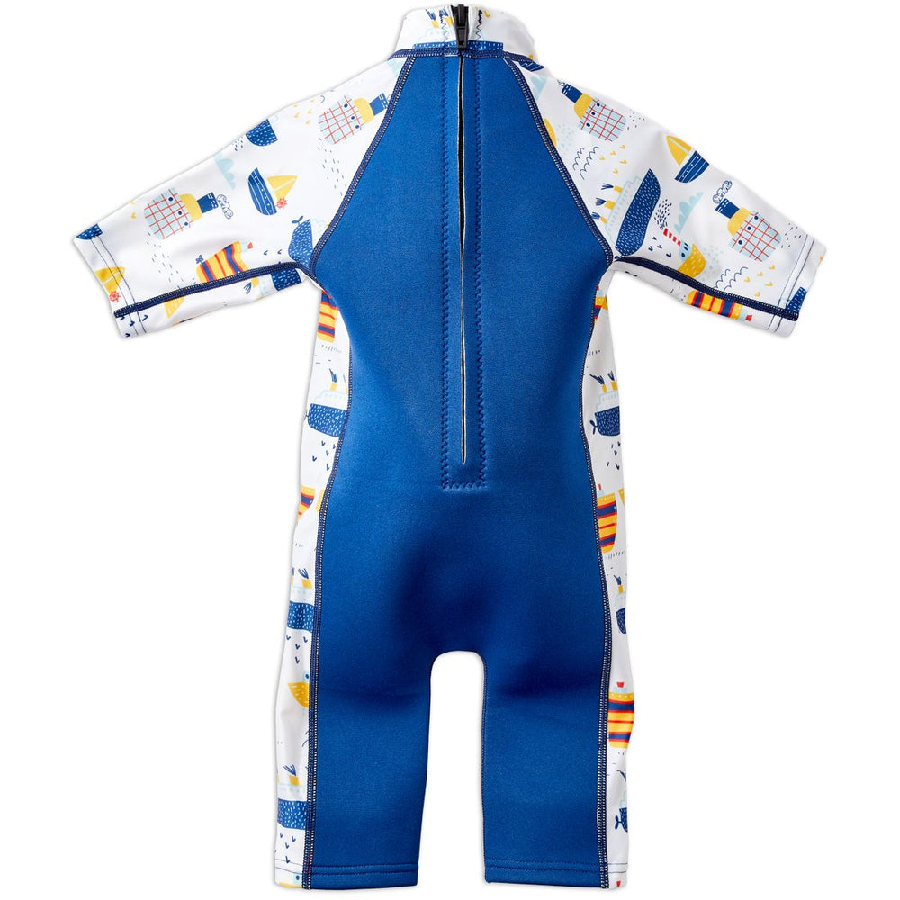 One piece UV sun and sea wetsuit for toddlers in white and navy. Boats themed print on sleeves, side panels and neck. Navy panel at the back, including zip.