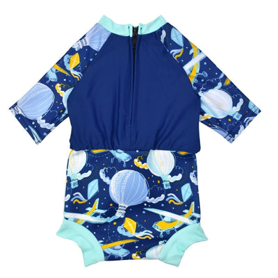 Happy Nappy Sunsuit in navy blue and sky themed print, including airplanes, kites, clouds and hot air balloons. Back.