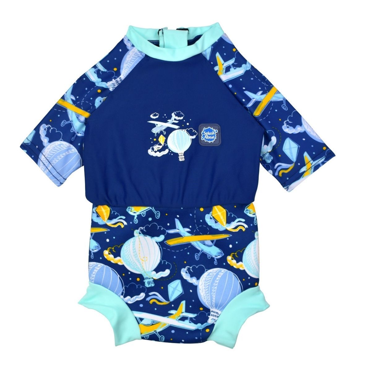 Happy Nappy Sunsuit in navy blue and sky themed print, including airplanes, kites, clouds and hot air balloons. Front.