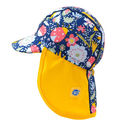 Legionnaire style sun hat in navy blue, with yellow trims and floral print panel . Side.