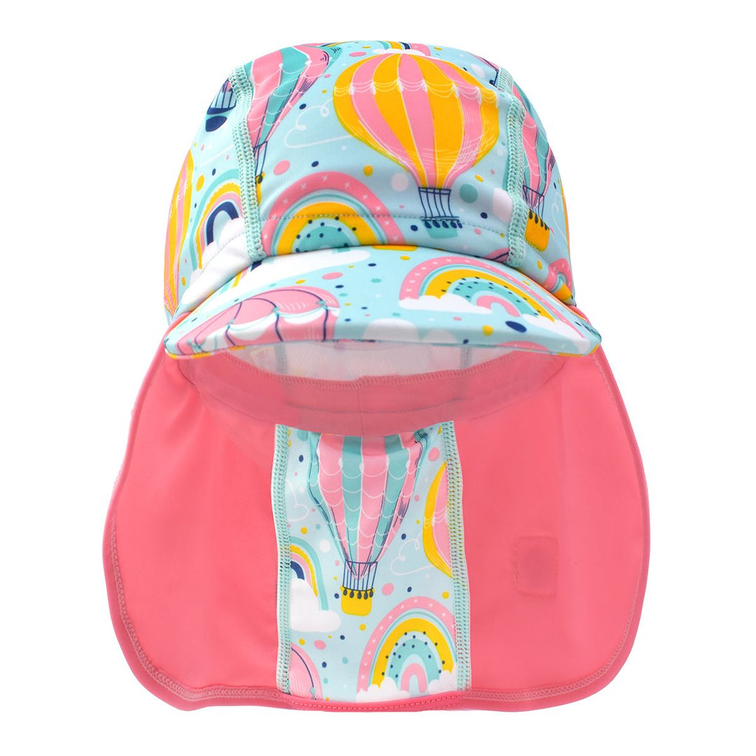 Legionnaire style sun hat in baby blue and pink, with hot air balloons themed print panel, including clouds and rainbows. Front.