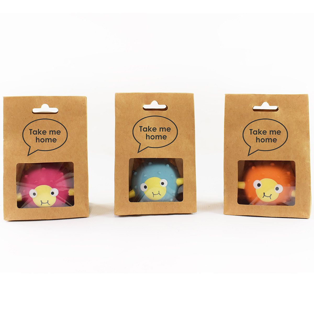 Display of the 3 colours available for the pufferfish toys inside packaging.